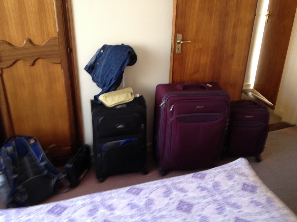 Pink on the Right: Mac’s suitcases for a month Black on the Left: Elizabeth’s suitcases for 2 months 